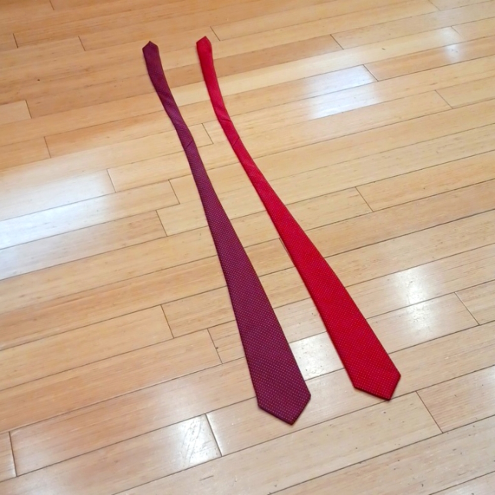 2 castle ties. Maroon and yellow and red and yellow